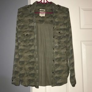 could be worn alone or paired with an outfit